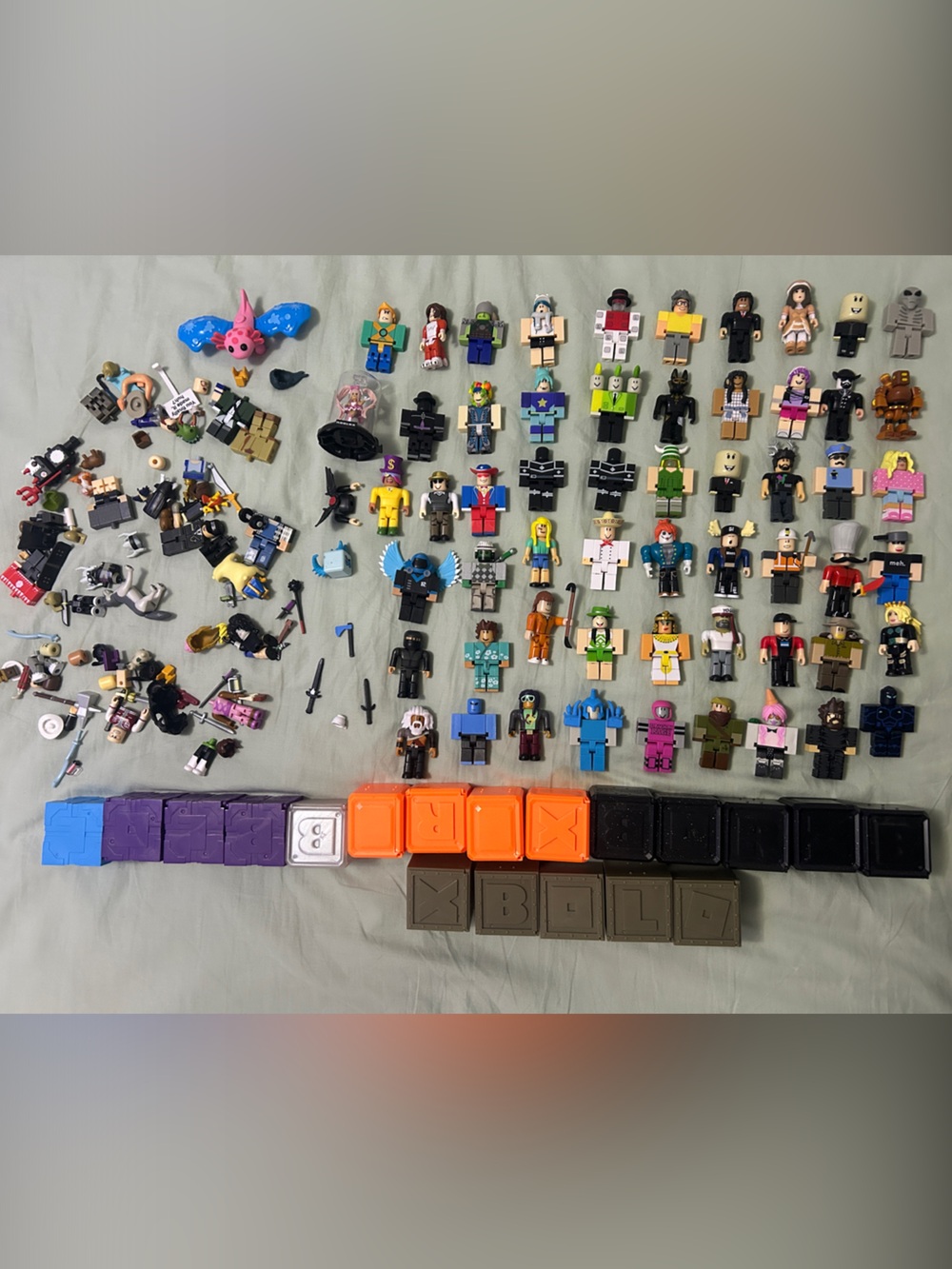 Huge lot roblox toys 56 figures + assorted parts and accessories and boxes